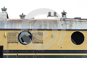 Old locomotive with broken windows