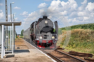 Old locomotive on the rural railway