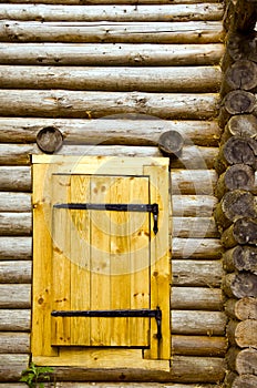 Old log house background new wooden door of board