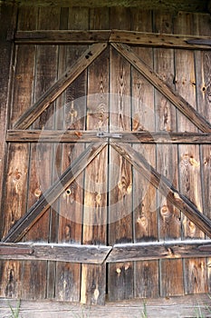 Old log shed. The gates are locked shut.