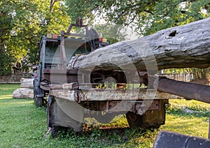 Old Logging truck with wooden logs