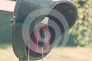 Old lonely payphone in an abandoned village