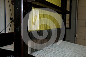 Old loom with cotton