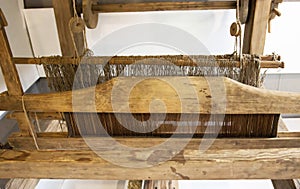 Old loom. Device for the manufacture of textile products, close-up, traditional