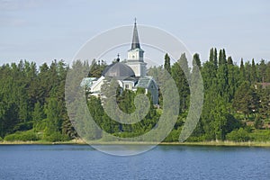 Old Lutheran church on the Church hill in the sunny June afternoon. Ruokolakhti, Finland