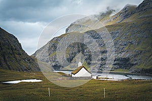 The old Lutheran church in Saksun village with view over the saksun falley on the island of Streymoy, Faroe Islands