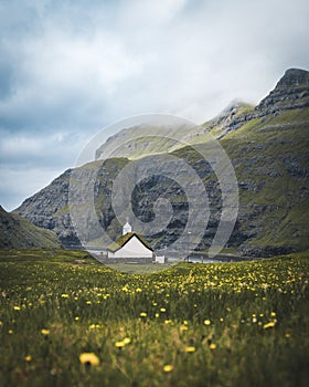 The old Lutheran church in Saksun village with view over the saksun falley on the island of Streymoy, Faroe Islands