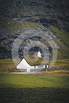The old Lutheran church in Saksun village with view over the saksun falley on the island of Streymoy, Faroe Islands