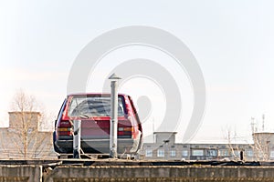 The old machine standing on the roof