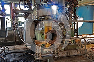 Old machinery of abandoned factory from inside
