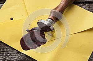 Old mail envelope with red wax seal stamps