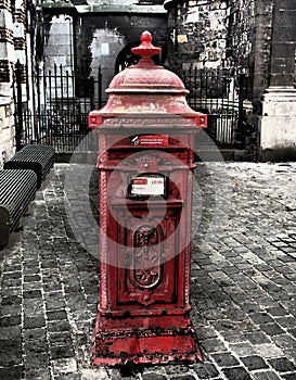 An old mailbox in which the letters are placed photo