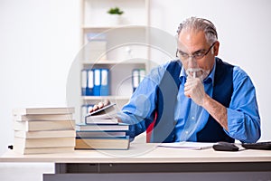 Old male author writing books