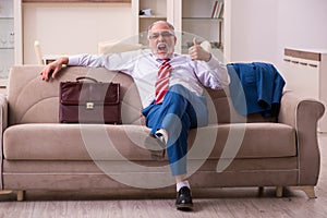 Old male boss employee coming home from work