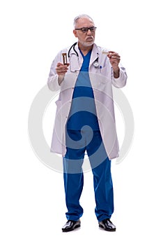 Old male doctor in time management concept isolated on white