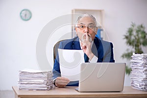 Old male employee and too much work in the office