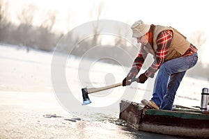 Old man in boat with ax