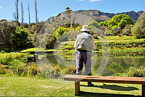 Old man busy with flyfishing