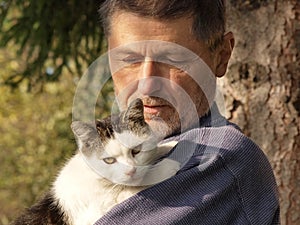 Old man with a cat