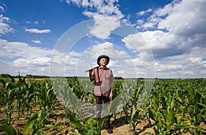Old man in corn field