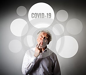 Old man and Covid-19. Coronavirus and disease concept