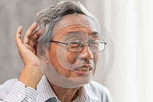 old man with Deaf Hearing problems