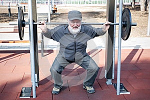 Old man doing fitness