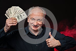 Old man with dollar bills