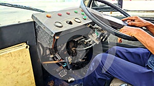 Old man driving an old car