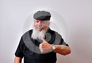 Old man gives his approval with a thumbs up
