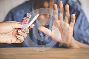 Old man hand refusing cigarette no more and stop smoking concept