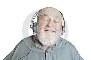 old man with headphones listening to music