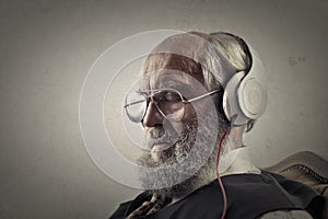 Old man listening to music