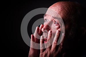 Old man looking frighten or scared