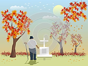 An old man looks at his lover`s grave with maple trees  background