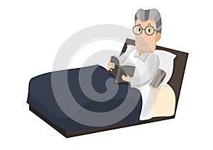 Old man lying in a bed reading a book.