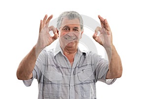 Old man making okay gesture