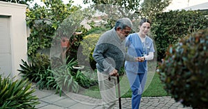 Old man, nurse and helping hand to walk for senior care, fresh air and kindness with support and trust. Rehabilitation