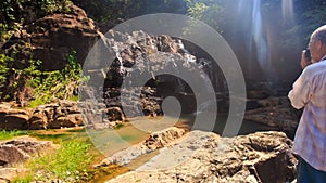 Old Man Photos Rocky Cave Mountain River Waterfall by Pagoda