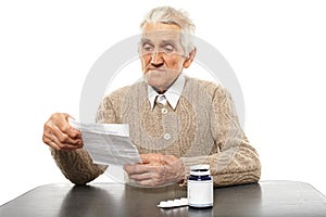 Old man with pills