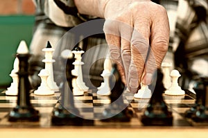 Old man playing chess