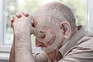 Old man praying