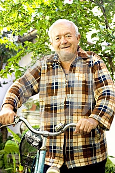 Old man riding bicycle