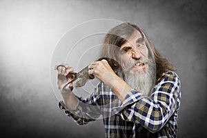 Old Man Scissors Cutting Hair, Senior with Crazy Face Self Trim