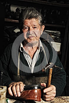 Old man, shoemaker