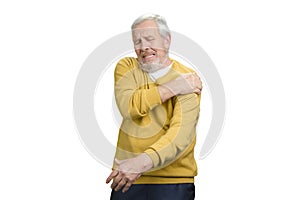 Old man with shoulder pain.