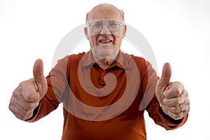 Old man showing thumb up with both hands