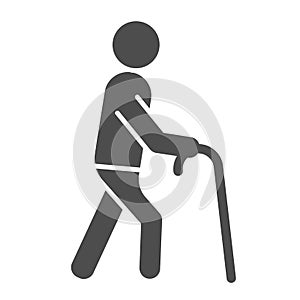 Old man solid icon. Man with walking stick vector illustration isolated on white. Old person glyph style design