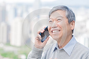 Old man speak on phone