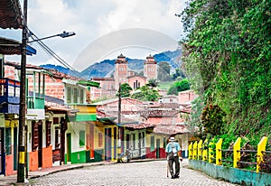 Old man in the streets of colonial village in the center of Jerico, Colombia